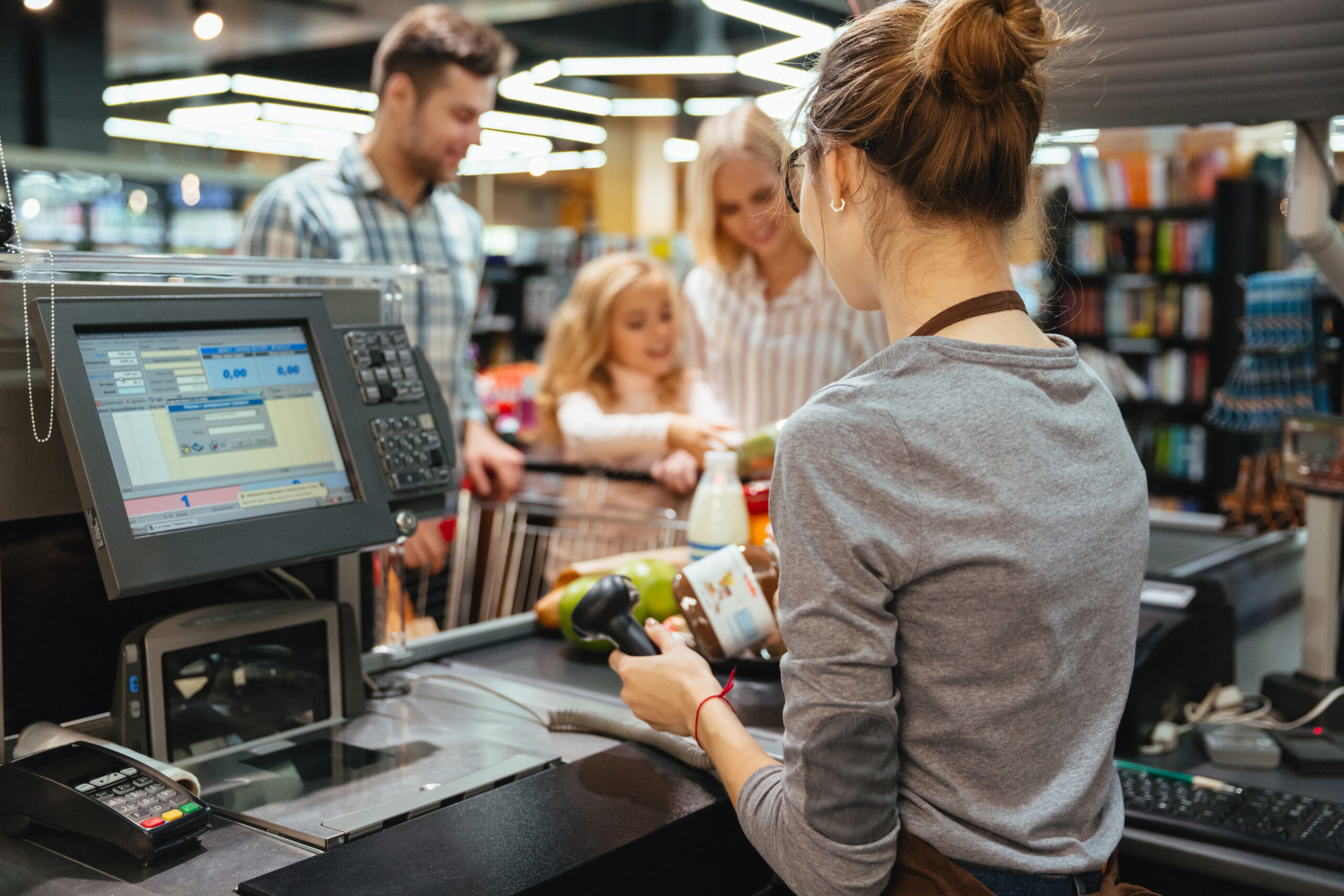 beautiful family standing cash counter scaled