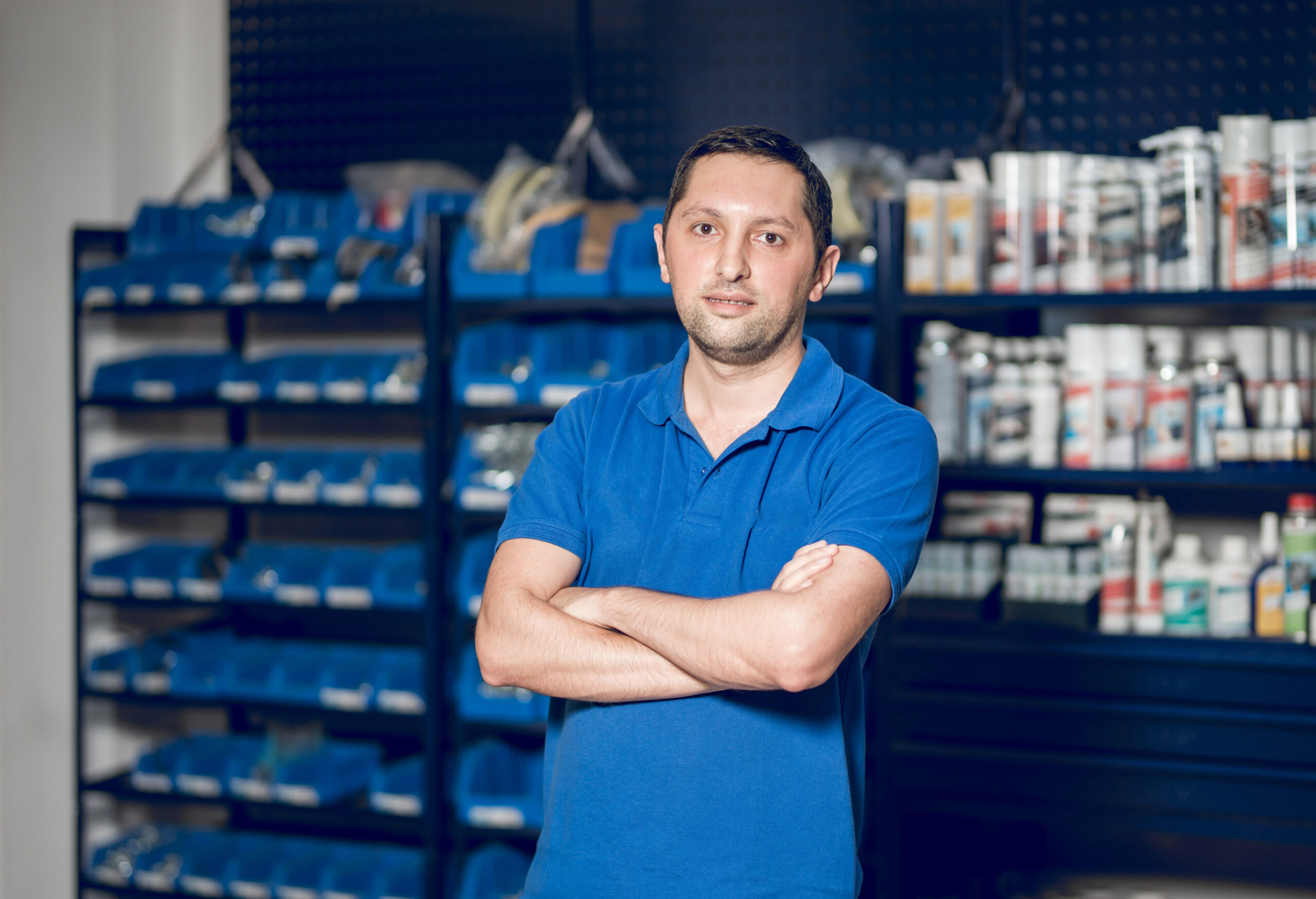 salesman standing front showcases scaled