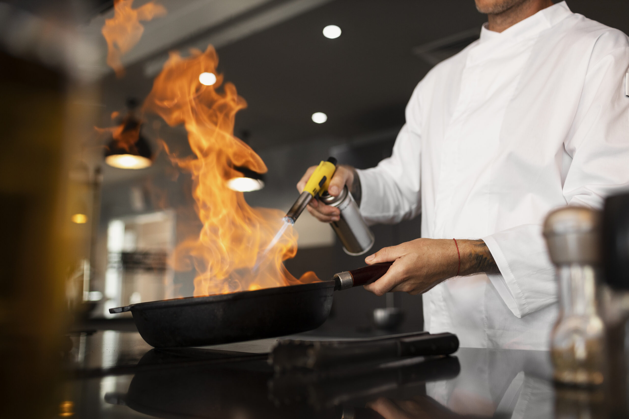 side view man cooking job scaled